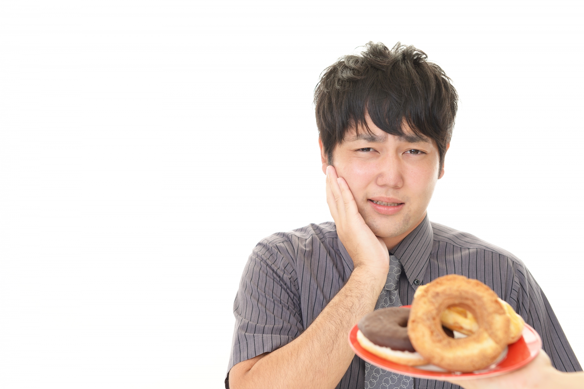歯が痛い男性